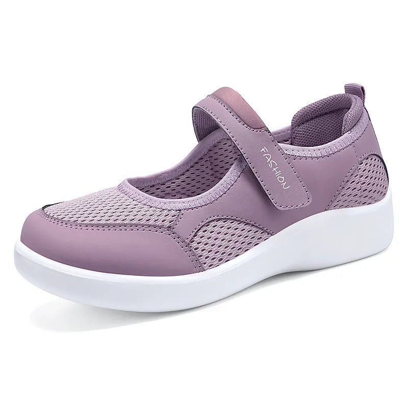 Women's breathable mesh casual shoes in black with Velcro closure and round toe design