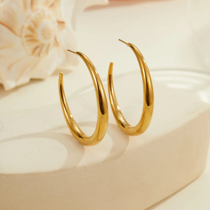 Titanium steel geometric round hoop earrings with 18K gold plating available in large and small sizes