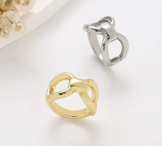 Women's titanium steel ring with hollow butterfly design and geometric pattern in gold colour