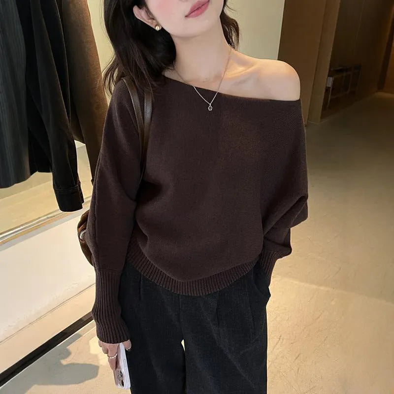 Women's long sleeve viscose pullover blouse in free size shown in one of seven colours.