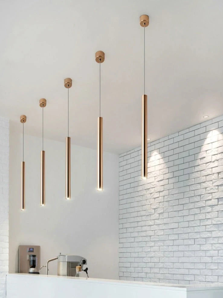 Gold cylindrical chandelier with iron construction and PMMA lampshade in multiple size options from 3.2x30cm to 6x80cm