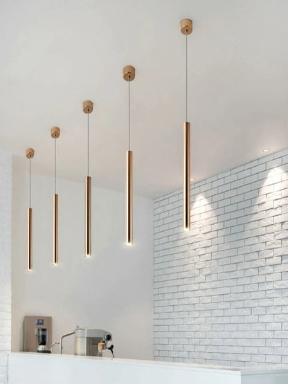 Gold cylindrical chandelier with iron construction and PMMA lampshade in multiple size options from 3.2x30cm to 6x80cm