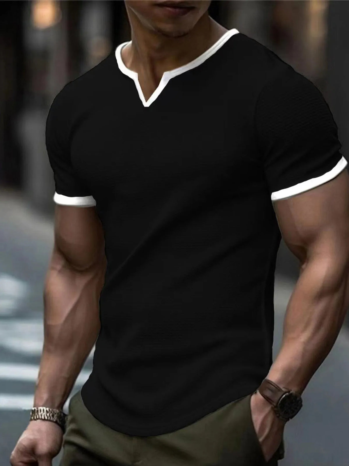 V-neck colour-block waffle texture outdoor sports T-shirt in polyester fabric on a neutral background.