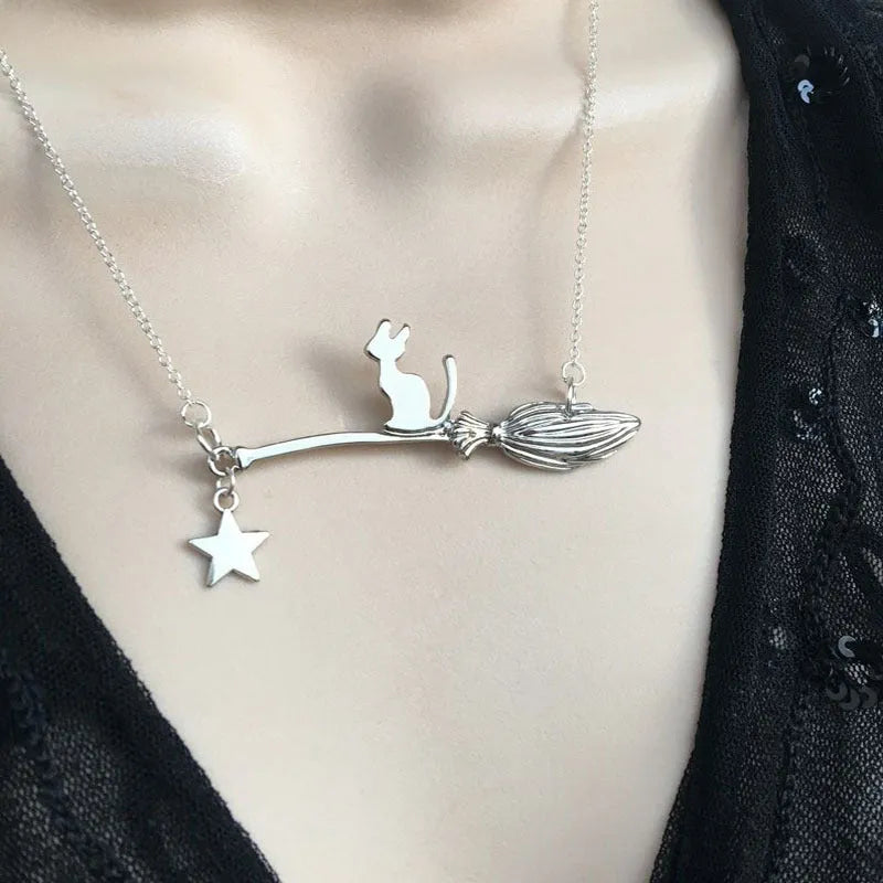 Black cat pendant necklace for women in alloy with gold, silver, and black cat colour variations.