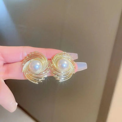 Pearl flower earrings with electroplated alloy construction and irregular vintage design