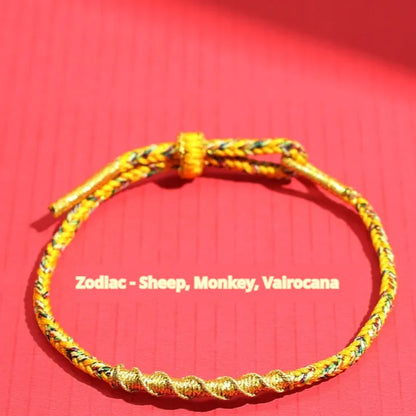 Woven eight-strand hand strap in zodiac-themed colours with flexible wire construction