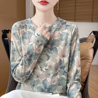 Women's round neck floral print pullover in Tencel cotton fabric, shown in a colourway from the range of five designs.