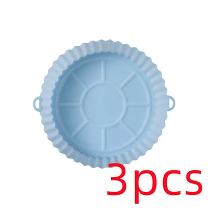 Round blue silicone baking tray mat with 4.5cm sides on a kitchen counter.