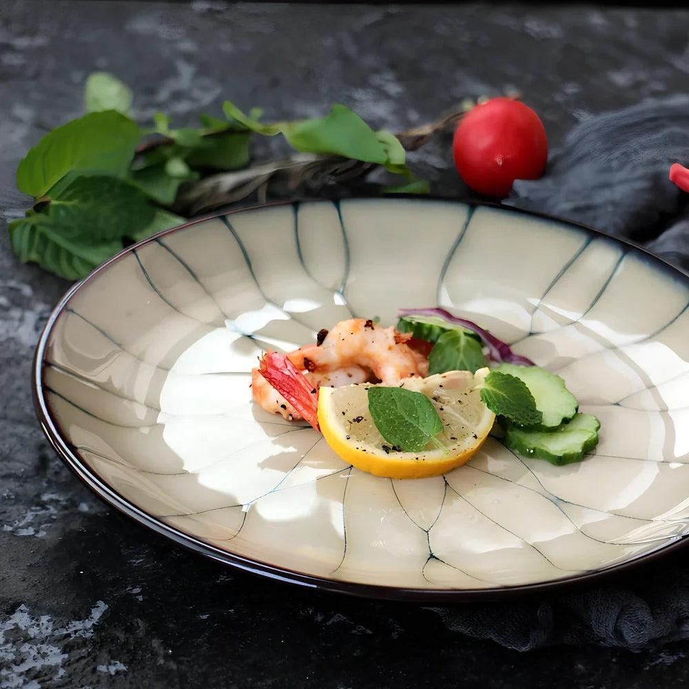 Japanese porcelain round plate 21cm diameter with underglaze design, deep bowl variant and 27.8cm serving size