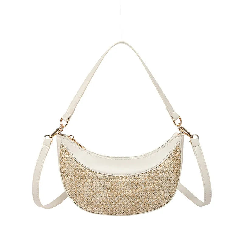Women's straw crossbody dumpling bag in dumpling shape with contrast stitching details