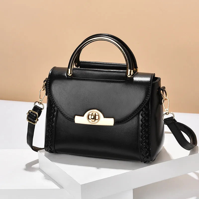 Women's PU leather crossbody messenger bag with double connector strap, soft handle, horizontal square shape, sold in black white or green