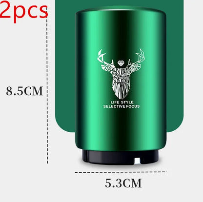 Stainless steel automatic bottle opener measuring 8.4 cm by 5.3 cm on a kitchen counter