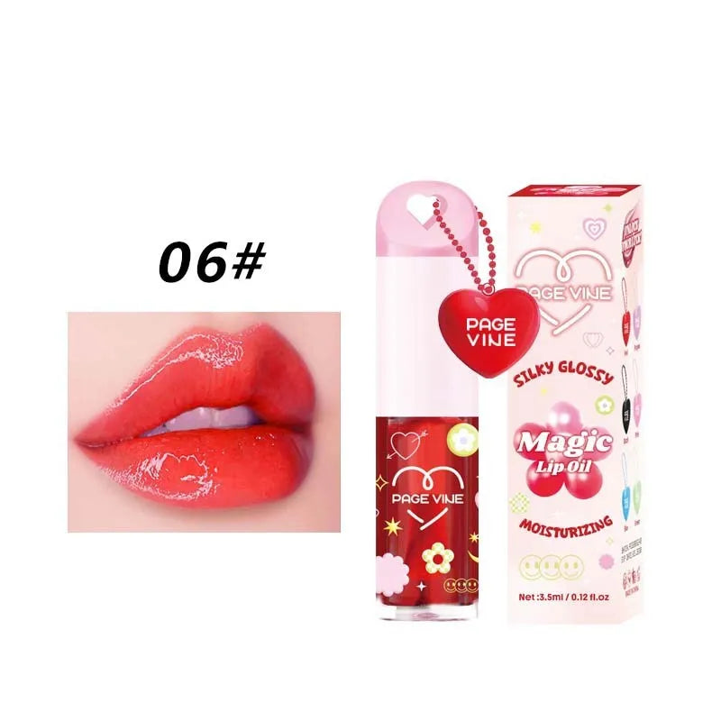 Colour-changing lip gloss with love pendant charm on applicator, from the Princess series.