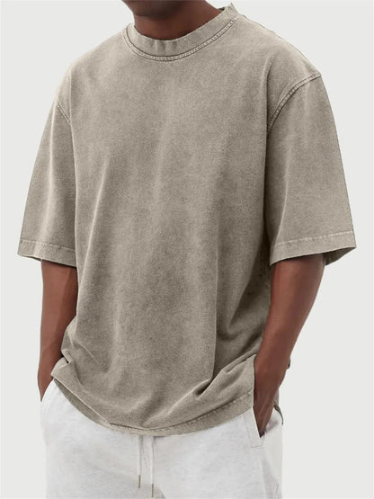 Men's loose fit stone-washed distressed short sleeve t-shirt in solid colour