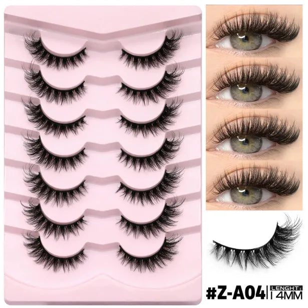 Box containing six pairs of black artificial fibre false eyelashes with different styles and a tube of clear lash glue.