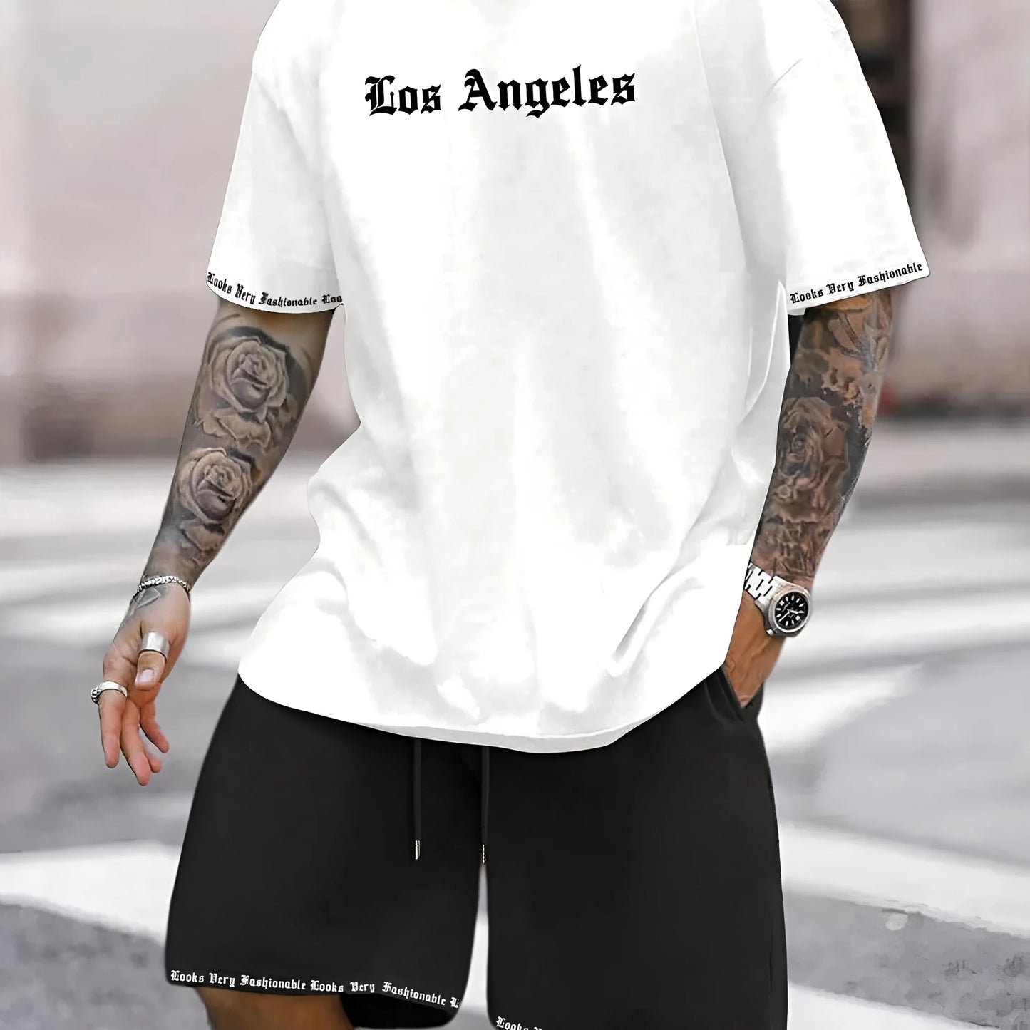 Man wearing a printed short-sleeve sports top and matching shorts in a quick-dry polyester blend.
