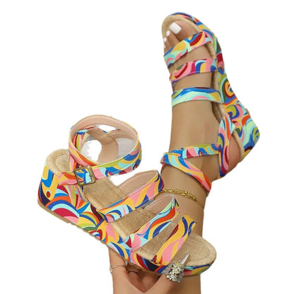 Women's lightweight buckle strap wedge sandals with a fish mouth toe design, shown in colour.