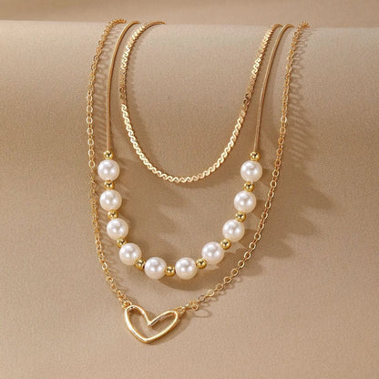 Vintage love heart pearl gold necklace with adjustable chain and electroplated pendant