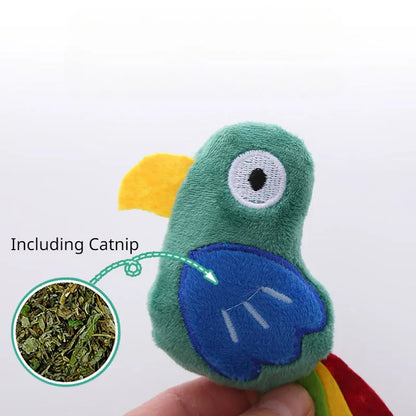 Plush cat toy in cow, crocodile, or parrot shape with colourful fabric and embroidered details.
