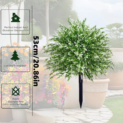 White artificial lavender plant with green leaves, a plastic floor decoration for home or events.