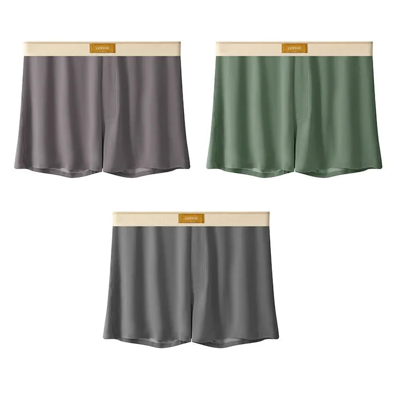 Pack of three pairs of solid colour men's ice silk briefs on a white background