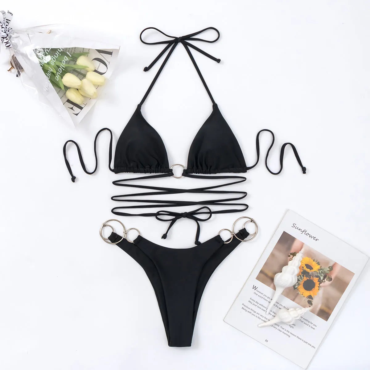 Black women's bikini set with metal ring detail and long straps, showing front and back.