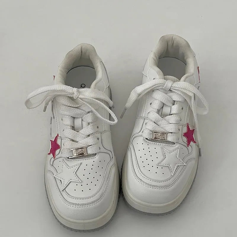 Women's Korean style low-top sneakers in black or white with PU upper, round toe, and front lace-up fastening, sizes 35-40
