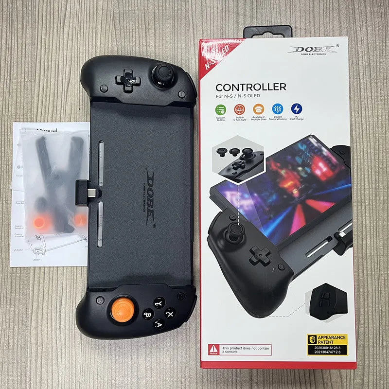 Black and white Nintendo Switch gamepad with console inserted, showing buttons, gyroscope, and Type-C charging port.