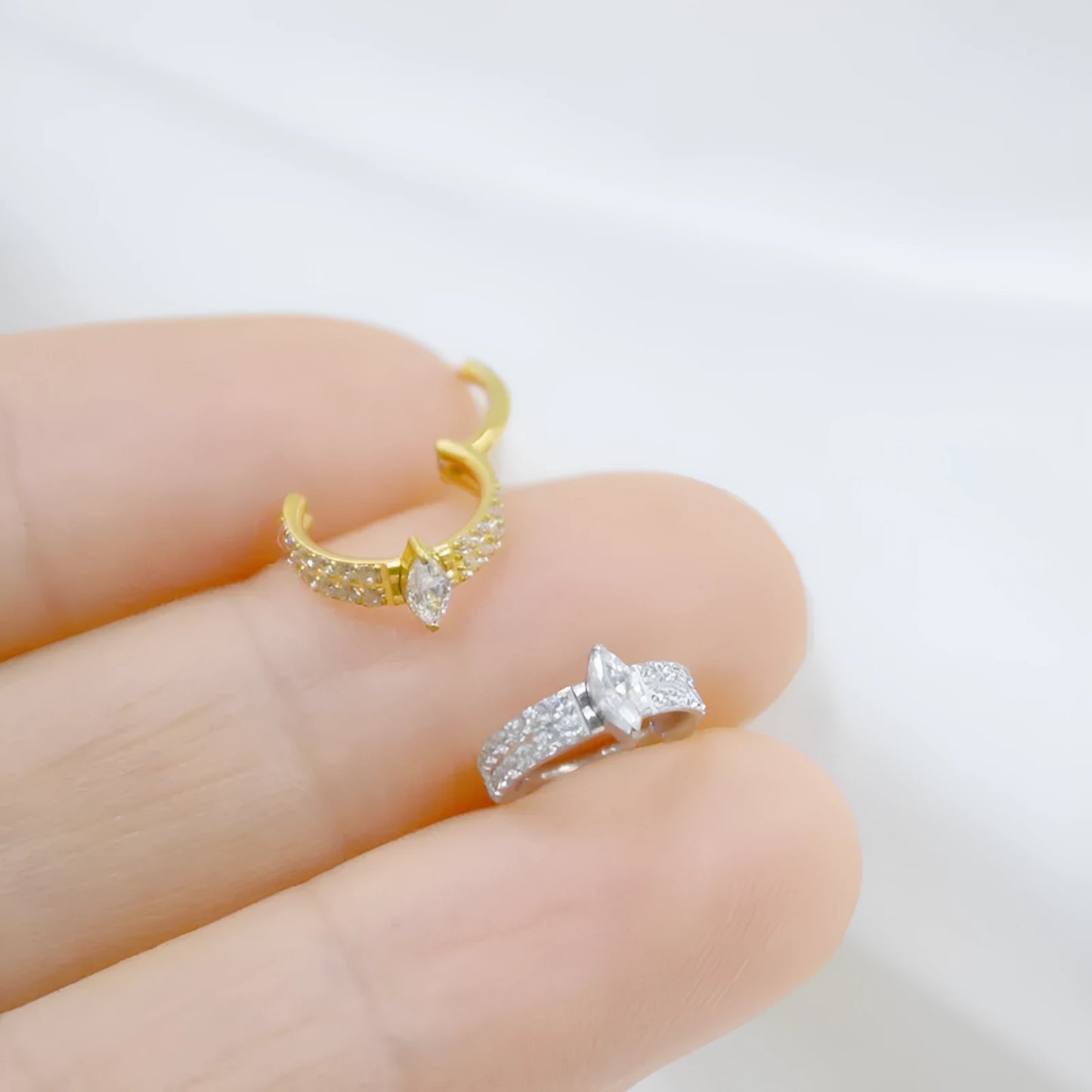 Heart shaped zircon earrings in titanium steel with diamond treatment in gold and silver colour options