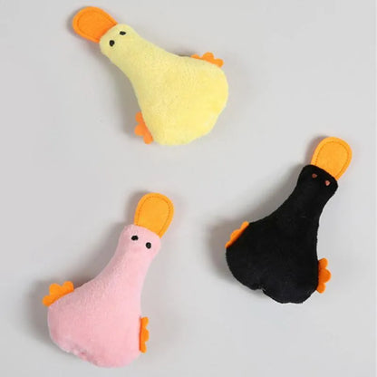 Duck-shaped plush pet toy with catnip filling and squeak mechanism for dog and cat play