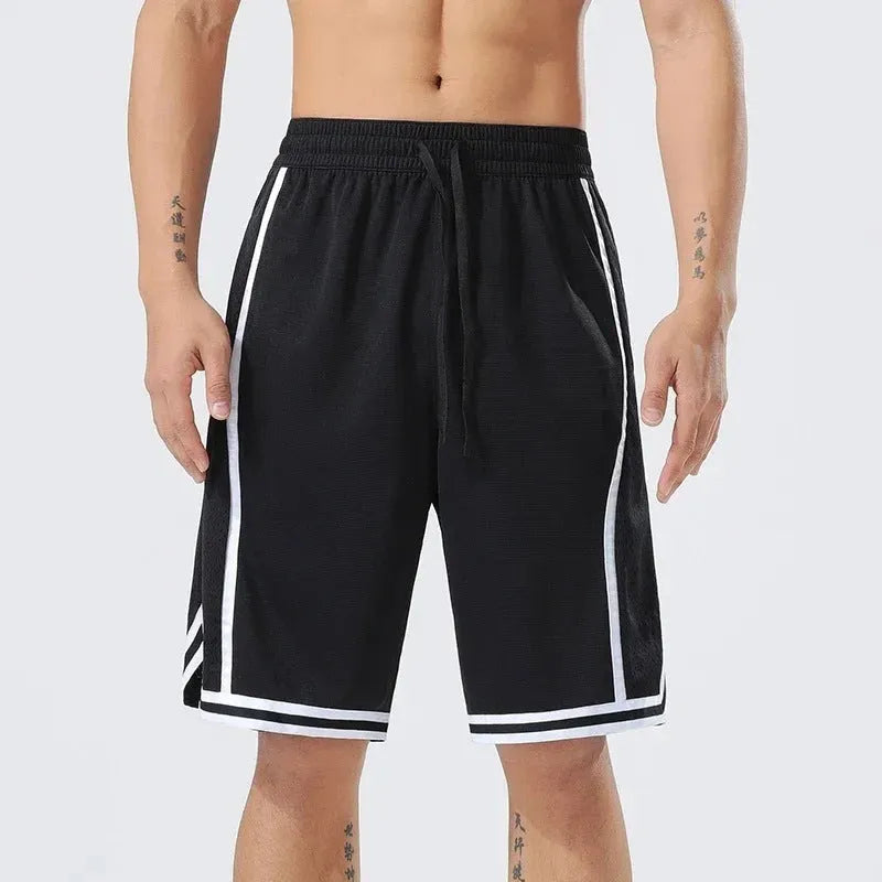 Men's straight-leg polyester sports training shorts in a grey colour, shown on a model.