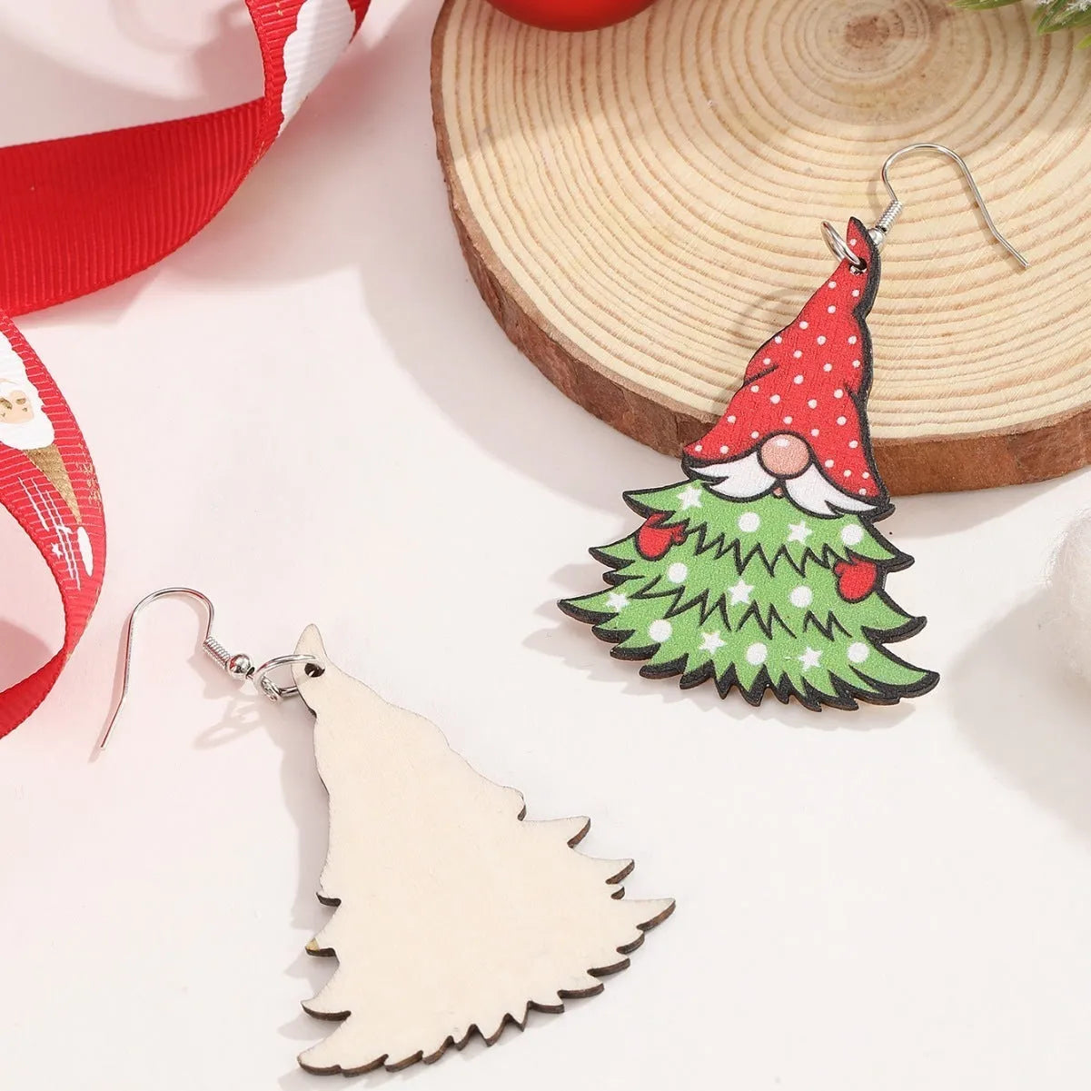 Geometric wooden Christmas earrings with printed Santa Claus motifs in Christmas tree and water drop snowman designs
