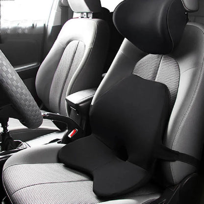 Black memory cotton car seat cushion with lumbar support and integrated headrest on a car seat.