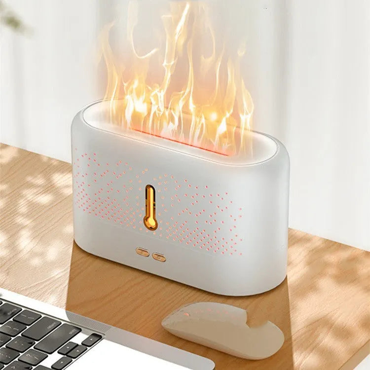 White ultrasonic aromatherapy diffuser with USB cable and essential oil bottle on packaging