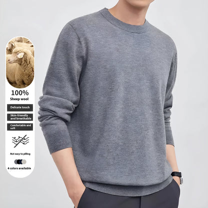 Men's V-neck wool pullover sweater in light grey shown on a model.
