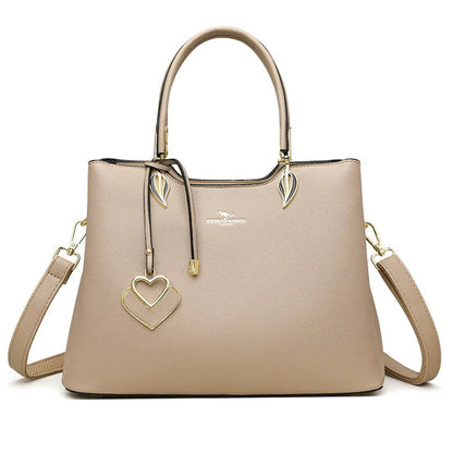 Black women's multi-layer PU leather shoulder messenger bag with sewing thread detail.