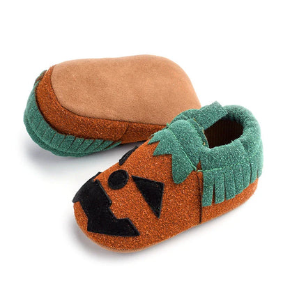 Pumpkin-themed costume shoes for toddlers and young children in various sizes and colours