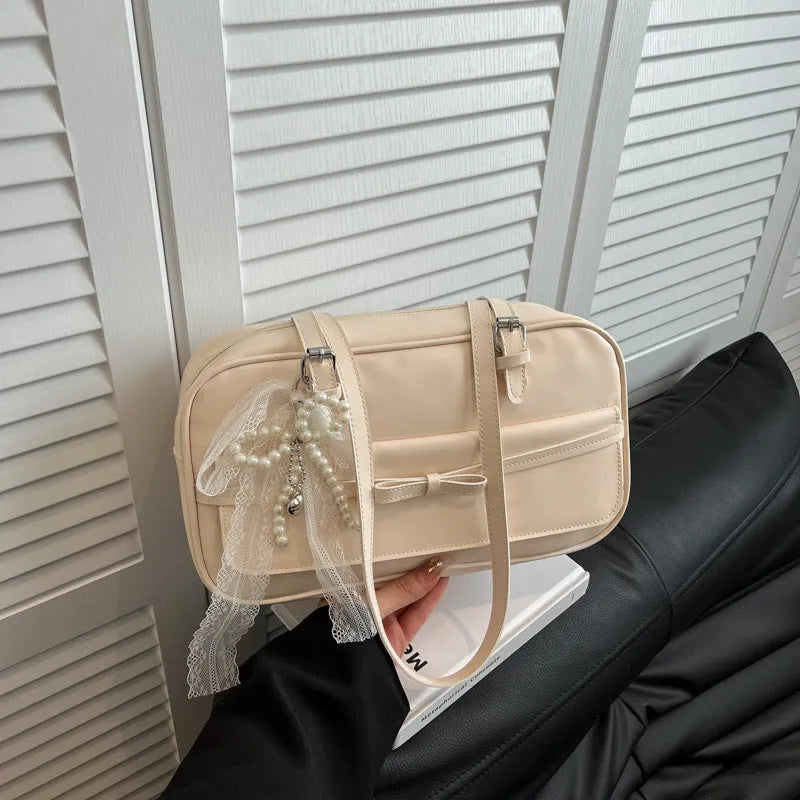 PU single shoulder bag with mobile phone compartment in horizontal square shape with optional pearl bow ornaments