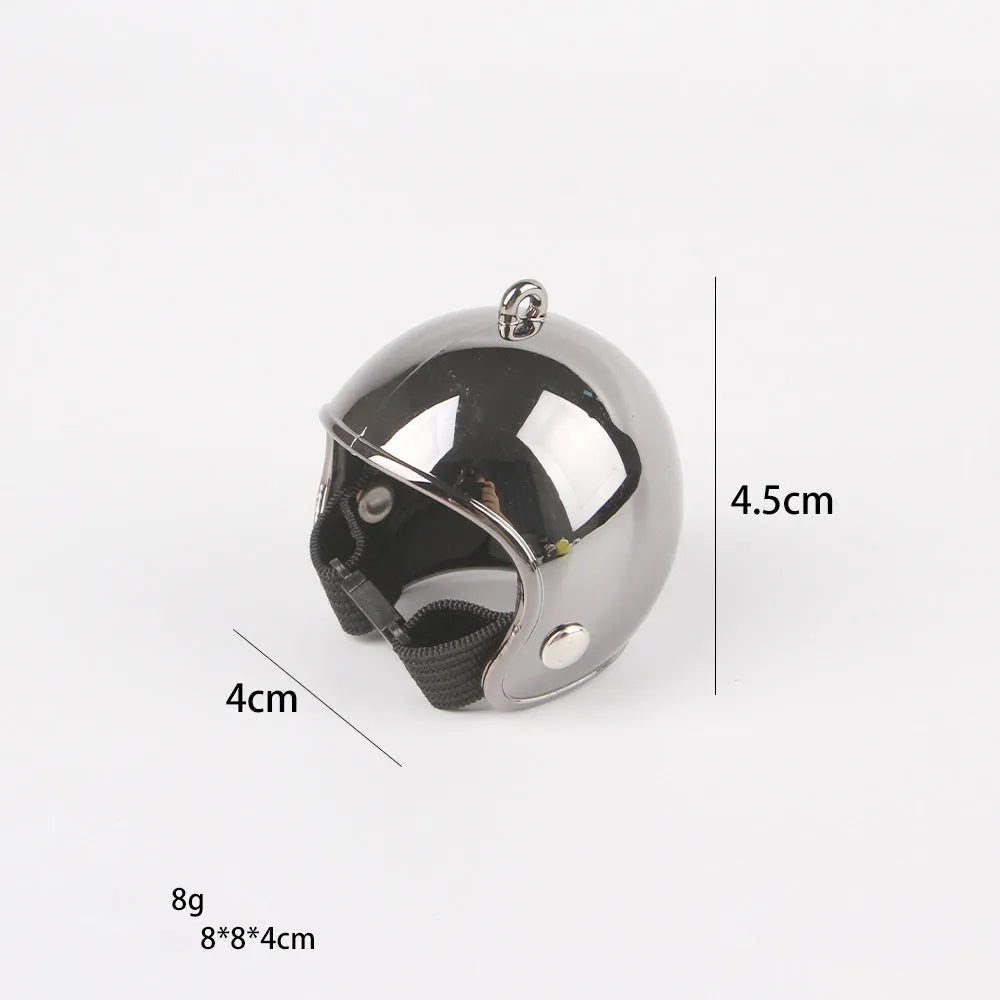 Small hard plastic helmet with elastic straps and sponge lining, designed for a chicken or bird to wear.