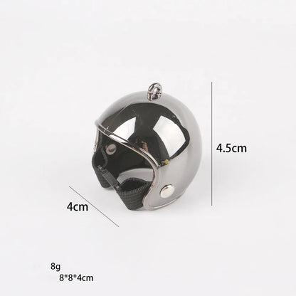 Small hard plastic helmet with elastic straps and sponge lining, designed for a chicken or bird to wear.