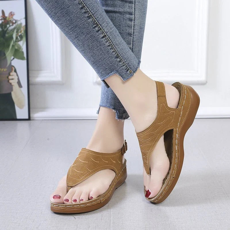 Comfortable women's wedge sandals in various colors with adjustable straps and a lightweight sole