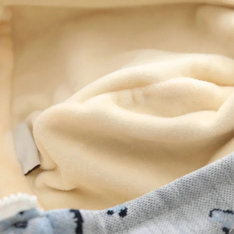 Blue dog sweater with front zipper closure on a mannequin.