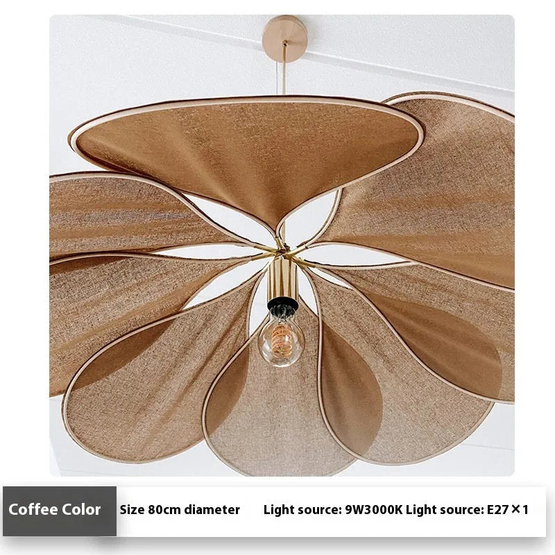 A cloth-craft hanging lamp in log wind Bohemian style, showing fabric texture and soft light diffusion.