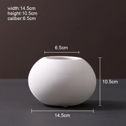 Modern Scandinavian ceramic vase with textured inlay surface decoration