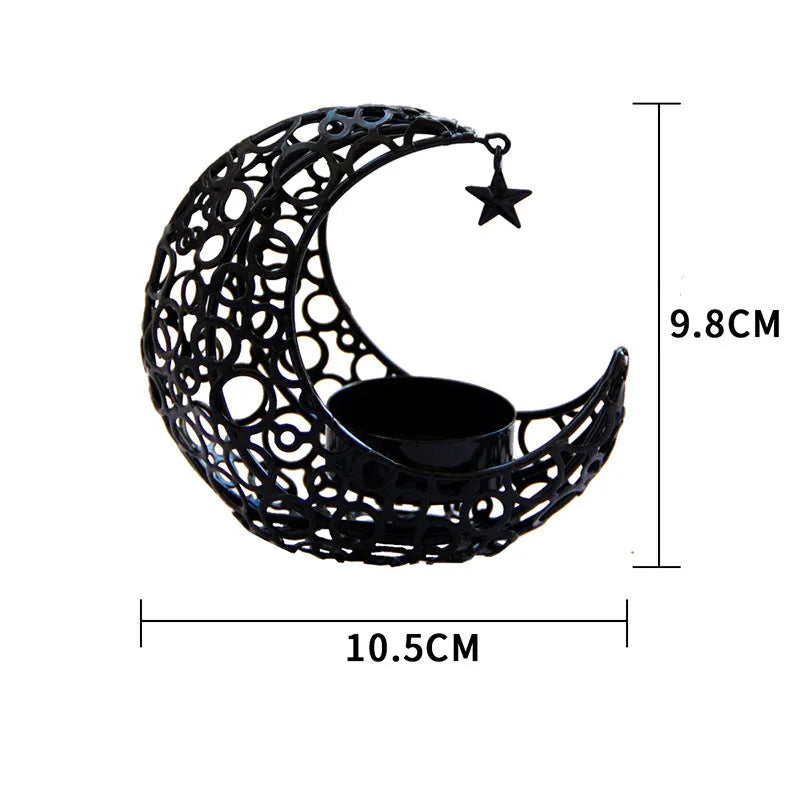Metal crescent moon candle holder for tealight candles in black or gold colour on desktop