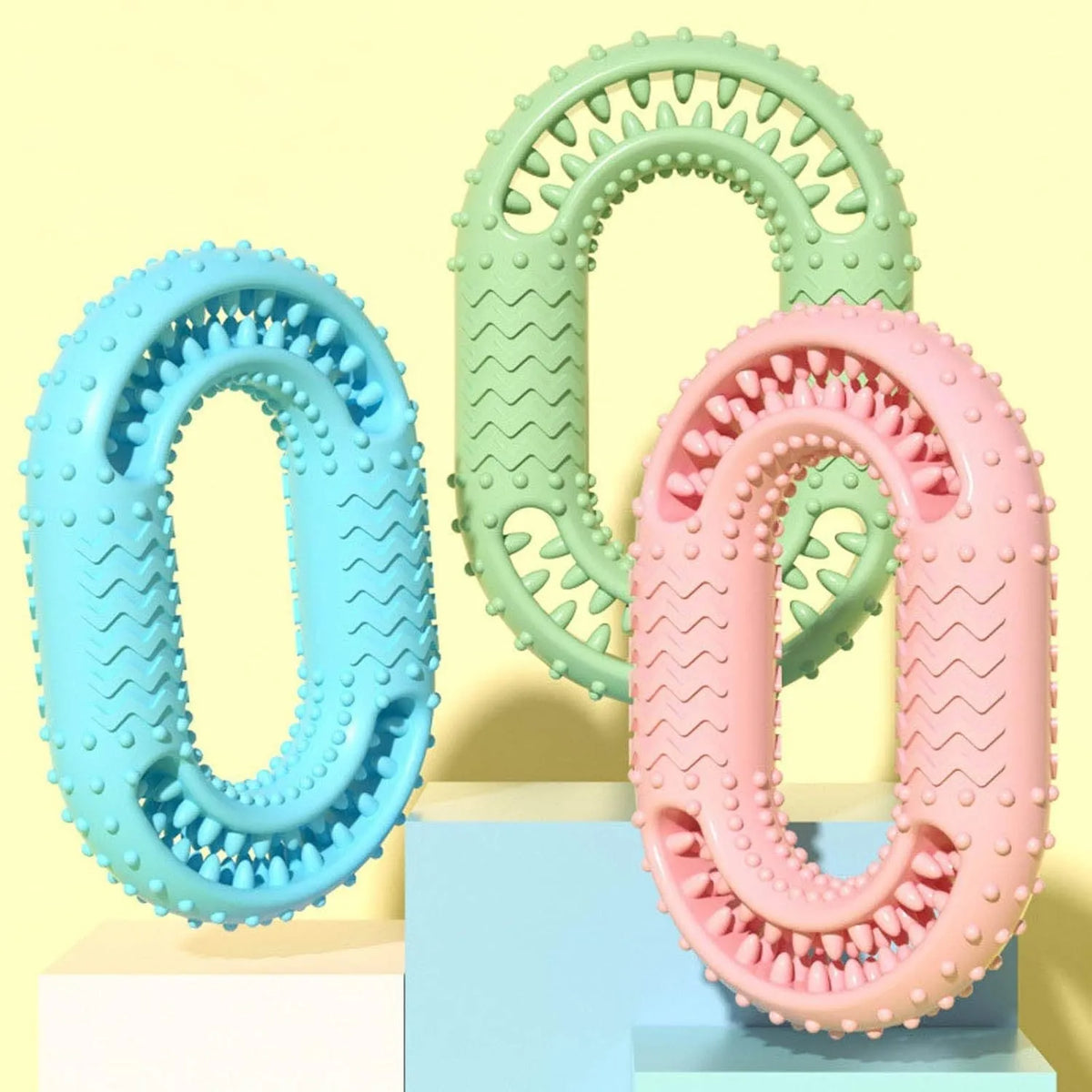 Blue O-ring shaped durable dog chew toy for aggressive chewers on a white background.