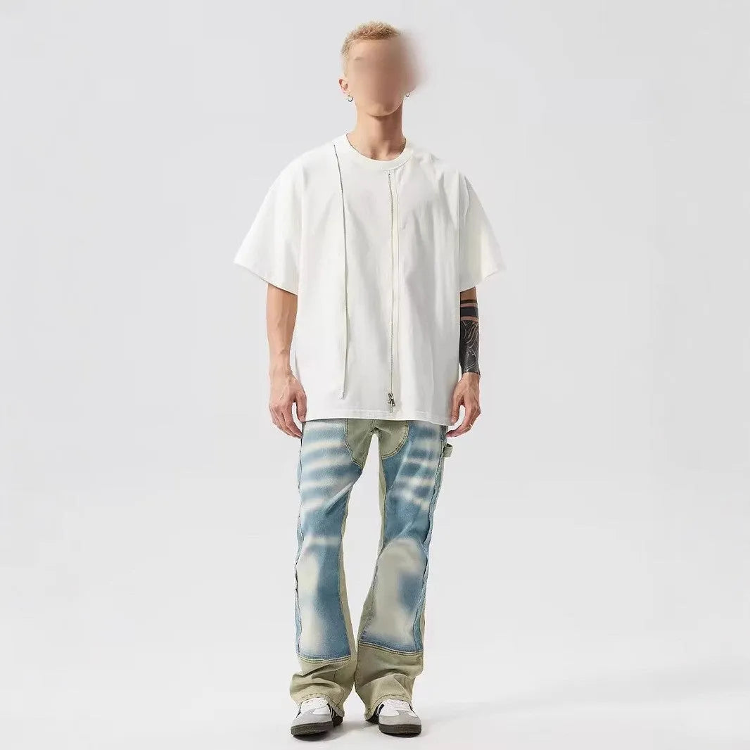 Yellow and blue patchwork splash-ink damaged jeans with mid-waist fit and zip placket