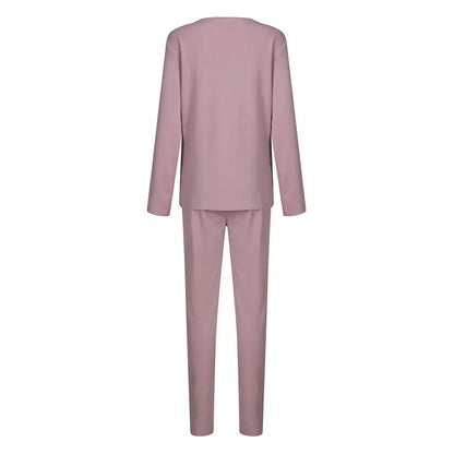 Cozy two-piece loungewear set for women in solid colors, featuring a crewneck top and drawstring-waist pants