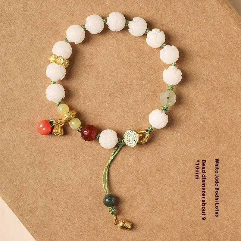 White jade Bodhi bracelet with lotus and pumpkin beads on open rope design
