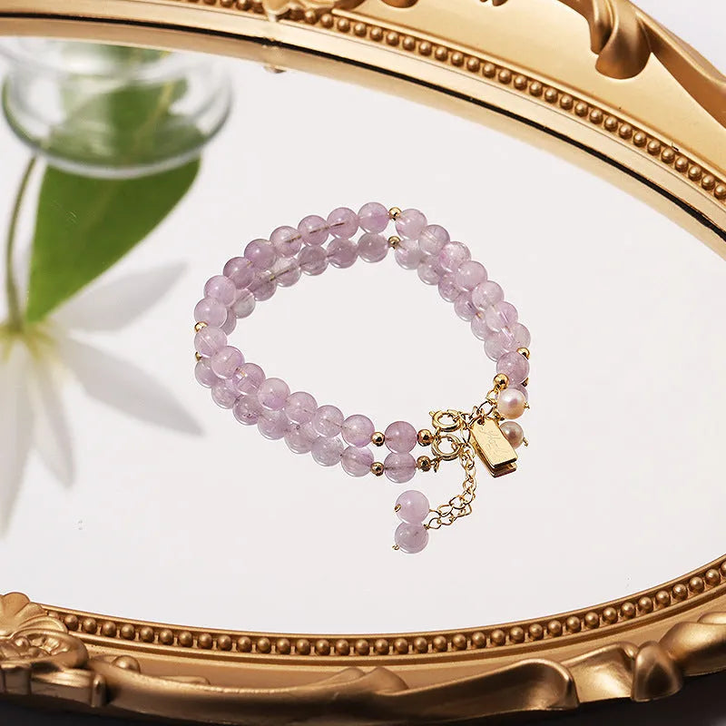 Women's natural lavender amethyst crystal bracelet in elegant design on wrist